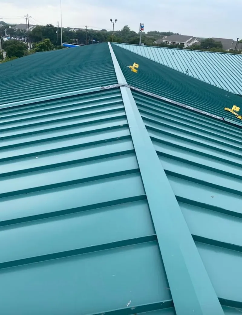 Green commercial metal roof ridge and valley for Metal Roof Repair in Walden