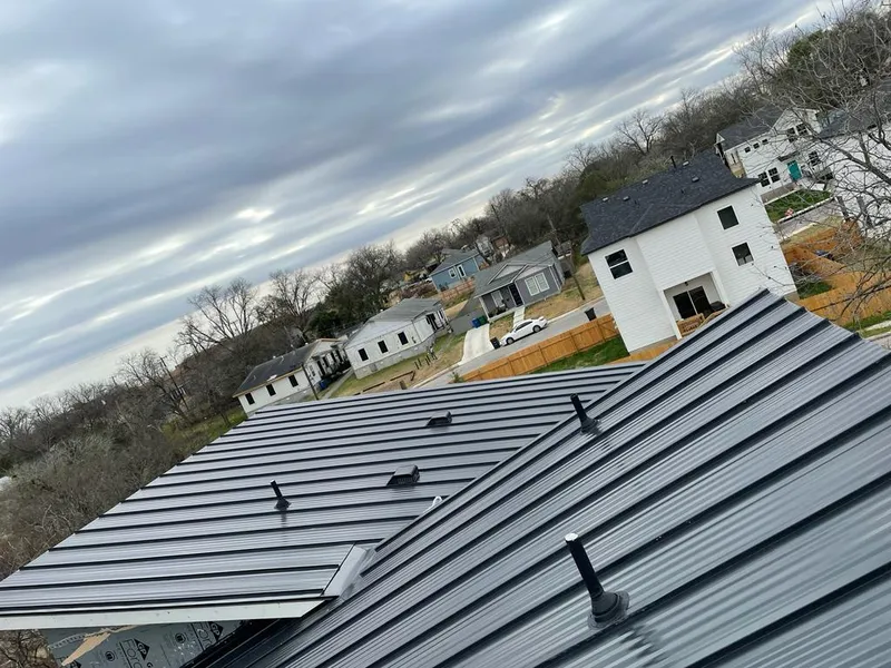 Standing seam metal roof panels with vents for Skylight Repair in Walden